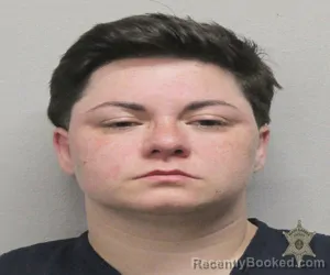 Mugshot of PAIGE CORMIER booked in Lafayette County, Louisiana on March 13, 2026