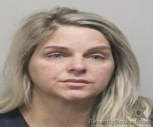 Mugshot of ORELINE TRAHAN booked in Lafayette County, Louisiana on March 14, 2026