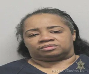 Mugshot of CHRISYNTHIA JOHNSON booked in Lafayette County, Louisiana on March 17, 2026