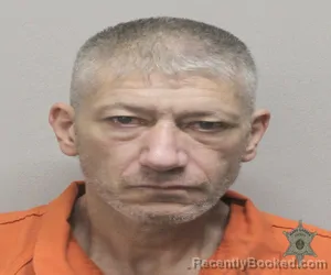 Mugshot of KERRY JAMES DOUCET booked in Lafayette County, Louisiana on March 17, 2026