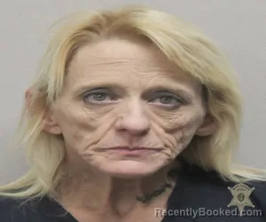 Mugshot of TINA DENISE STRUVE booked in Lafayette County, Louisiana on March 17, 2026