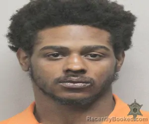 Mugshot of CHRISTIAN HARMON booked in Lafayette County, Louisiana on March 19, 2026