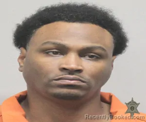 Mugshot of JONAS JOHN BATISTE booked in Lafayette County, Louisiana on March 20, 2026