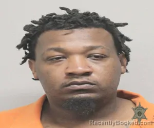 Mugshot of MALCOLM KENNERSON booked in Lafayette County, Louisiana on March 20, 2026