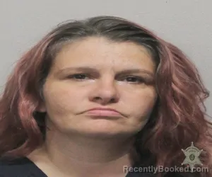 Mugshot of DANIELLE MARIE COOPER booked in Lafayette County, Louisiana on March 20, 2026