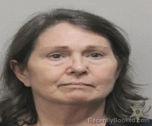 Mugshot of KIMBRA S RICKEY booked in Lafayette County, Louisiana on March 20, 2026