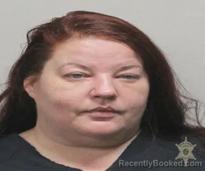 Mugshot of SARAH L GIBSON booked in Lafayette County, Louisiana on March 21, 2026