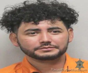 Mugshot of YEINIER H ENRIQUEZREYES booked in Lafayette County, Louisiana on March 21, 2026