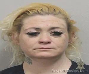 Mugshot of HOLLY SONNIER booked in Lafayette County, Louisiana on March 21, 2026