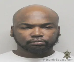 Mugshot of RONTRAVIS DEONTRE HOPKINS booked in Lafayette County, Louisiana on March 21, 2026