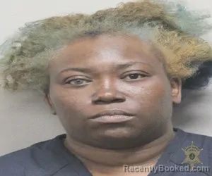 Mugshot of MYIESHA DESHA FAULK booked in Lafayette County, Louisiana on March 22, 2026