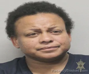 Mugshot of TYMETCHLA ZIKEA JOHNSON booked in Lafayette County, Louisiana on March 23, 2026