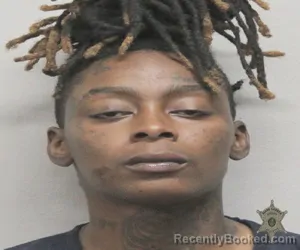 Mugshot of MARIANNA DALONNI DAVIS booked in Lafayette County, Louisiana on March 23, 2026