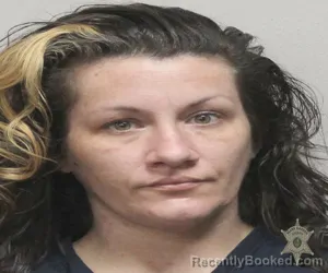 Mugshot of ELIZABETH RINARDO booked in Lafayette County, Louisiana on March 24, 2026