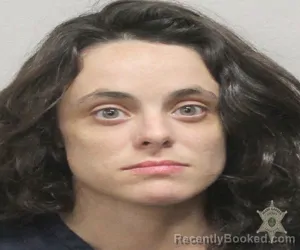 Mugshot of AUTUMN HIGGINBOTHAM booked in Lafayette County, Louisiana on March 24, 2026