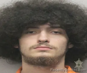 Mugshot of CAMDEN PESSON booked in Lafayette County, Louisiana on March 25, 2026