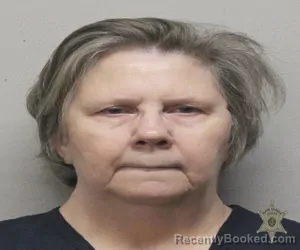 Mugshot of DANETTE MARIE HEBERT booked in Lafayette County, Louisiana on March 25, 2026