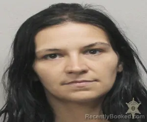 Mugshot of MARY ALAINA LEE booked in Lafayette County, Louisiana on March 26, 2026