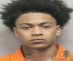 Mugshot of JAYDEN X MYERS booked in Lafayette County, Louisiana on March 26, 2026