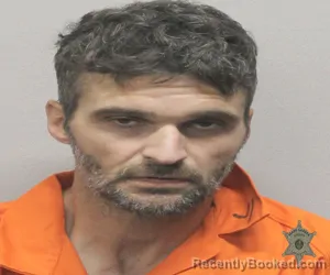 Mugshot of ANTHONY CHARLES TOUCHET booked in Lafayette County, Louisiana on March 27, 2026