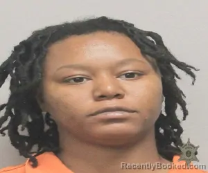 Mugshot of JOANASHA R MARTIN booked in Lafayette County, Louisiana on March 28, 2026