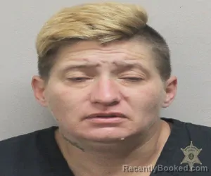 Mugshot of ALLYSON LEIGH RUTHERFORD booked in Lafayette County, Louisiana on March 29, 2026