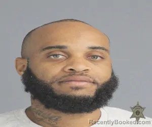 Mugshot of ARQUELLE JEANBATISTE booked in Lafayette County, Louisiana on March 30, 2026