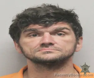 Mugshot of CHRISTOPHER DORE booked in Lafayette County, Louisiana on March 31, 2026