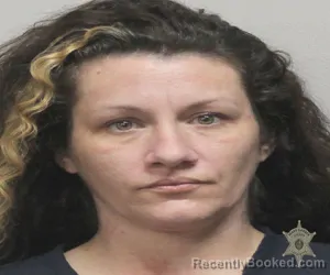 Mugshot of ELIZABETH RINARDO booked in Lafayette County, Louisiana on March 31, 2026