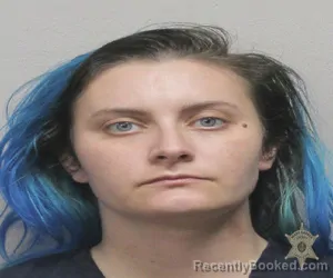 Mugshot of AMBER MICHAUD booked in Lafayette County, Louisiana on April 1, 2026