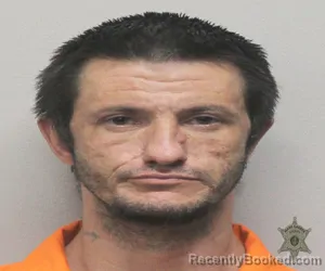 Mugshot of ERIC W SCHEXNEIDER booked in Lafayette County, Louisiana on April 1, 2026