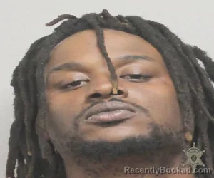 Mugshot of JEMARCUS DOMINICK booked in Lafayette County, Louisiana on April 3, 2026