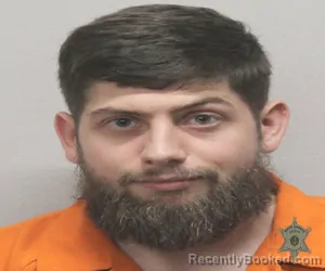 Mugshot of JUSTIN ROME booked in Lafayette County, Louisiana on April 3, 2026