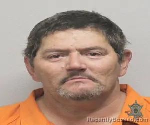 Mugshot of TODD ANTHONY ROMERO booked in Lafayette County, Louisiana on April 4, 2026