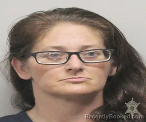 Mugshot of ASHLY N DEMARY booked in Lafayette County, Louisiana on April 4, 2026