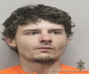 Mugshot of MICHAEL ROLAND RAYMOND booked in Lafayette County, Louisiana on April 4, 2026