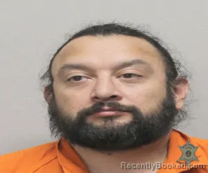 Mugshot of RAUL JIMENEZ booked in Lafayette County, Louisiana on April 8, 2026