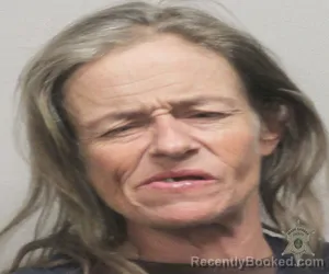 Mugshot of JENNIFER K KROEGER booked in Lafayette County, Louisiana on April 8, 2026