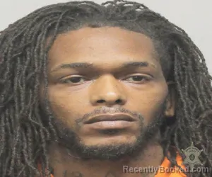 Mugshot of JOHNUA RIGGS booked in Lafayette County, Louisiana on April 8, 2026