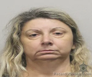 Mugshot of TINA M MILLER booked in Lafayette County, Louisiana on April 10, 2026