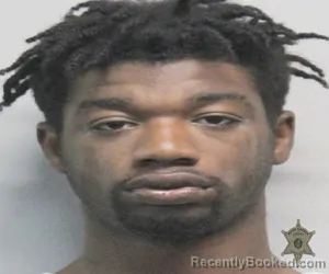 Mugshot of MASON TREVOR MOUTON booked in Lafayette County, Louisiana on April 10, 2026