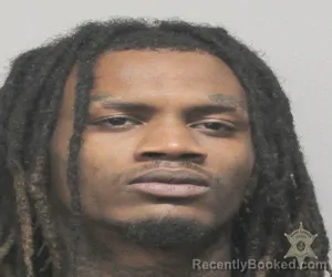 Mugshot of MAHKI HOLLIDAY booked in Lafayette County, Louisiana on April 14, 2026