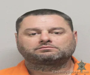 Mugshot of KENNETH WAYNE PREJEAN booked in Lafayette County, Louisiana on April 14, 2026