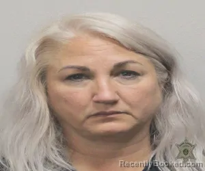 Mugshot of RAQUEL DAVID booked in Lafayette County, Louisiana on April 24, 2026