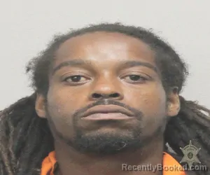 Mugshot of DION MILTON booked in Lafayette County, Louisiana on April 27, 2026