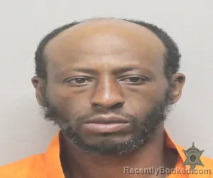 Mugshot of QUINTON DEJUAN CARROLL booked in Lafayette County, Louisiana on April 30, 2026