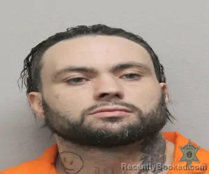 Mugshot of JACOB MALLET booked in Lafayette County, Louisiana on May 14, 2026