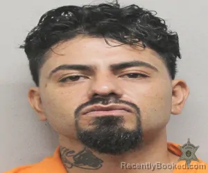 Mugshot of MIGUEL GARZA booked in Lafayette County, Louisiana on July 5, 2026