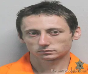Mugshot of KALEB SCHNEIDER booked in Lafayette County, Louisiana on July 20, 2026