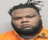 Mugshot of MALCOLM JAMON RHODES booked in Lafayette County, Louisiana on July 20, 2026